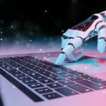 Robotic-hand-pressing-a-keyboard-on-a-laptop-3D-rendering