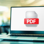 Laptop-computer-displaying-the-icon-of-PDF-file