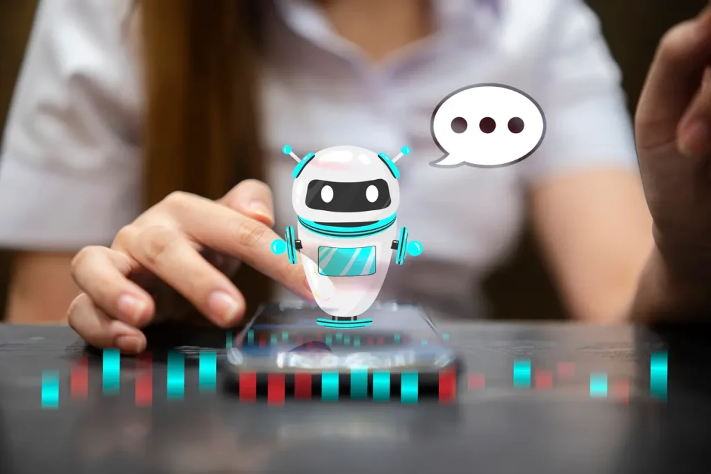 Chatbot-assistant-conversation-Ai-Artificial-Intelligence-technology-concept-Casual-business-woman-chatting-with-chatbot-via-mobile-smart-phone-application-while-working-on-laptop-computer