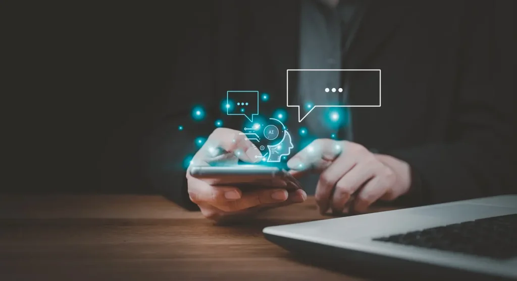 Businessman-using-chatbot-in-smartphone-intelligence-Ai-AI-with-AI-Artificial-Intelligence-developed-by-OpenAI-generate-Futuristic-technology-robot-in-online-system-Database-smart-chatbox