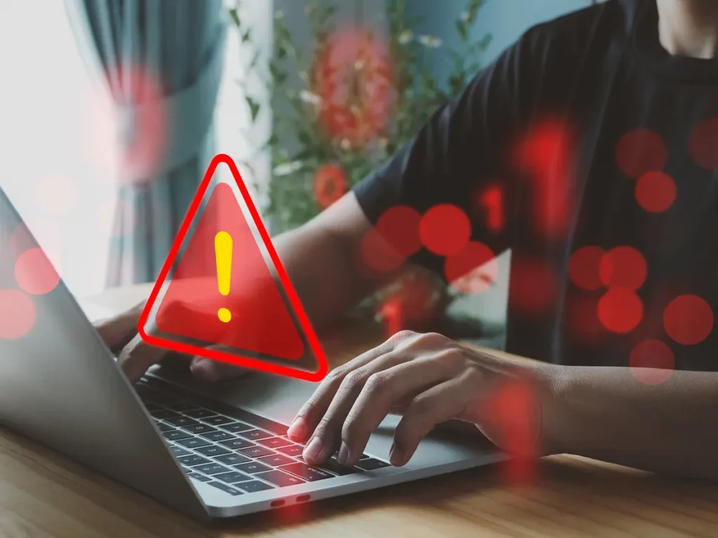 laptop-shows-a-warning-sign-of-system-failure-and-notification-spam
