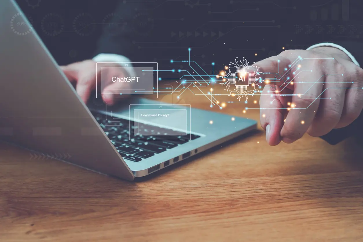 Ai-tech-businessman-using-laptop-virtual-graphic-Global-Internet-connect-AI-Chat-with-AI-using-command-prompt-for-generates-something-Artificial-Intelligence-Futuristic-technology-transformation