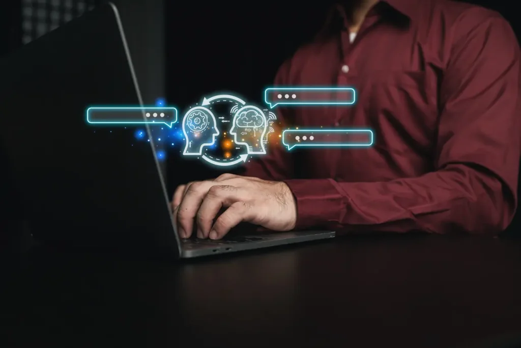 Person-typing-message-on-application-talking-to-AI-or-artificial-intelligence-conversation-with-future-artificial-intelligence-artificial-intelligence-technology-automated-chatbot-ChatBot-concept