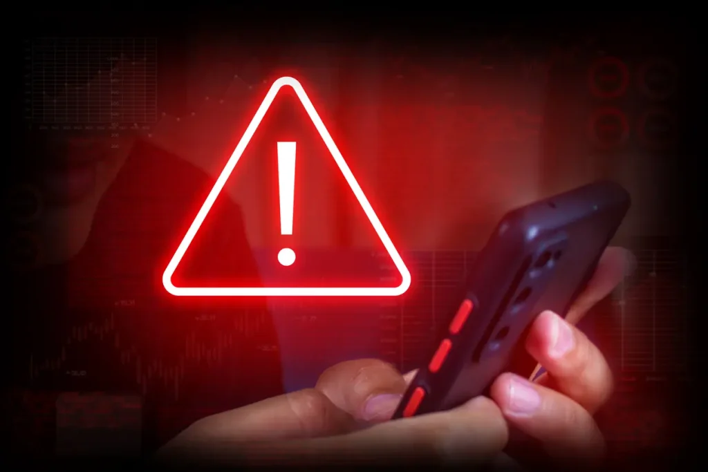Warning-notification-Businessman-or-User-with-spam-message-icon-on-mobile-phone-Triangle-caution-warning-sign-red-for-notification-error-and-maintenance-concept-warning-sign-exclamation
