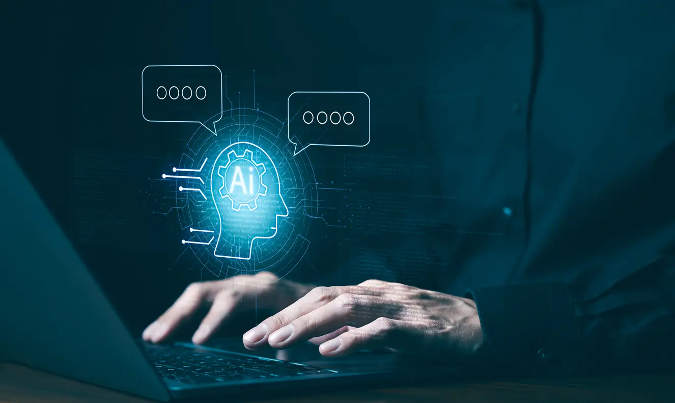 Chat-with-AI-or-Artificial-Intelligence-technology-Man-using-laptop-computer-chatting-with-an-intelligent-artificial-intelligence-and-enter-command-prompt-for-generate-some-things-help-work-Chatbot