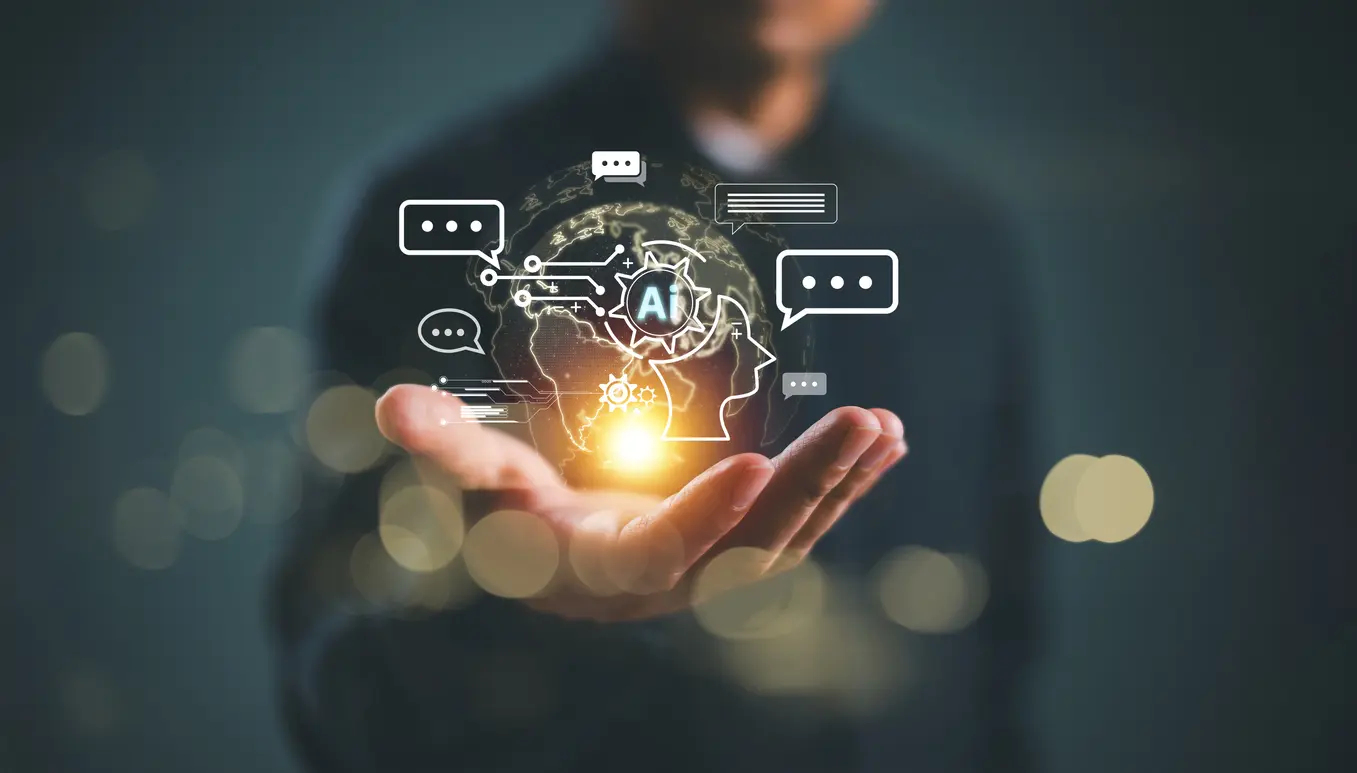 Ai-chatbot-business-technology-concept-Artificial-Intelligence-tech-Robot-chat-with-human-in-global-communication-hologram-on-hand-man-Bot-conversation-for-company-development-service-learning